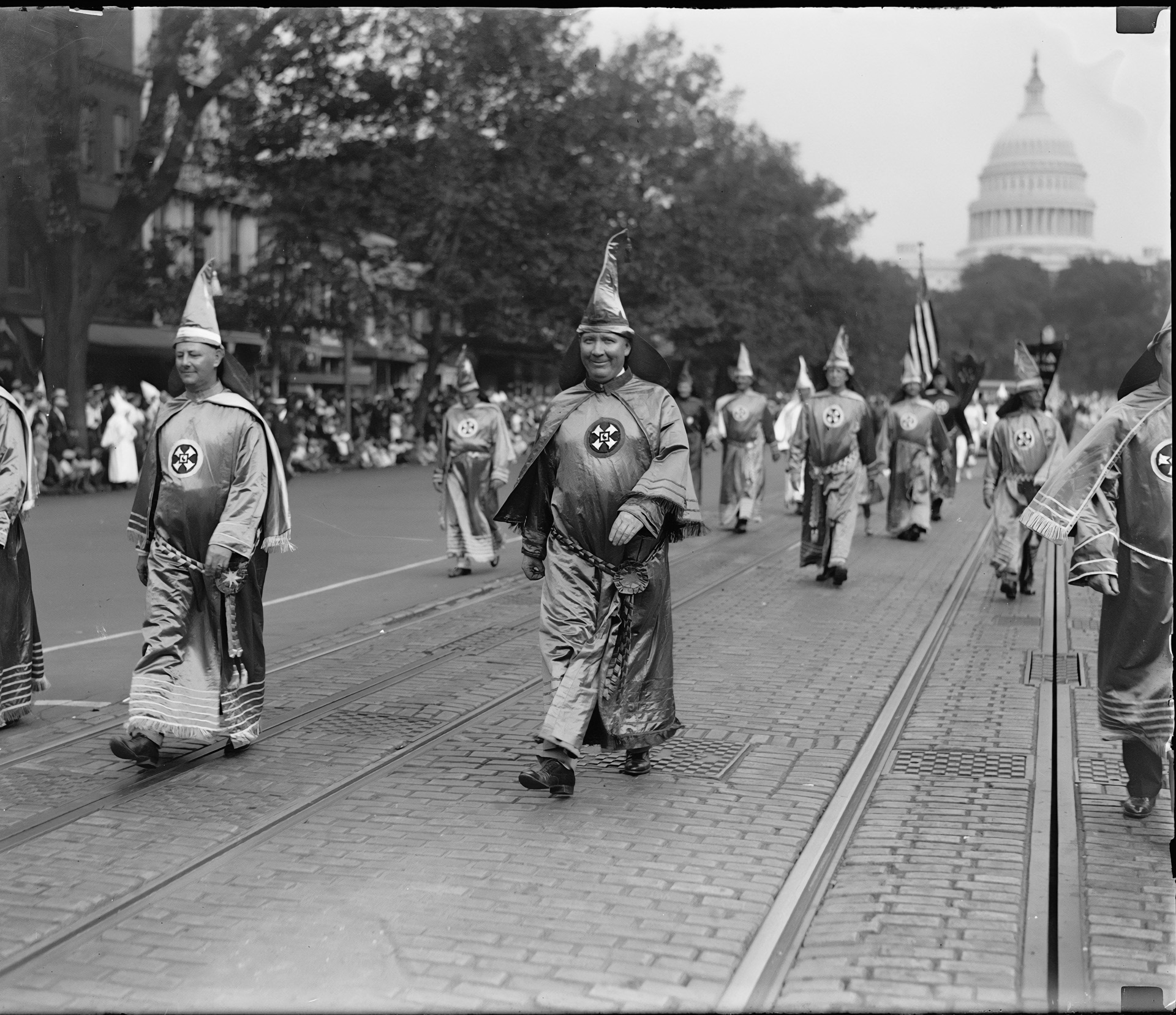 In 1925, thirty thousand members of the Ku Klux Klan marched in segregated Washington, DC. The next year hosted fifteen thousand marchers. Many marchers revealed their face with no fear of legal consequences for the group's terrorism and murder.