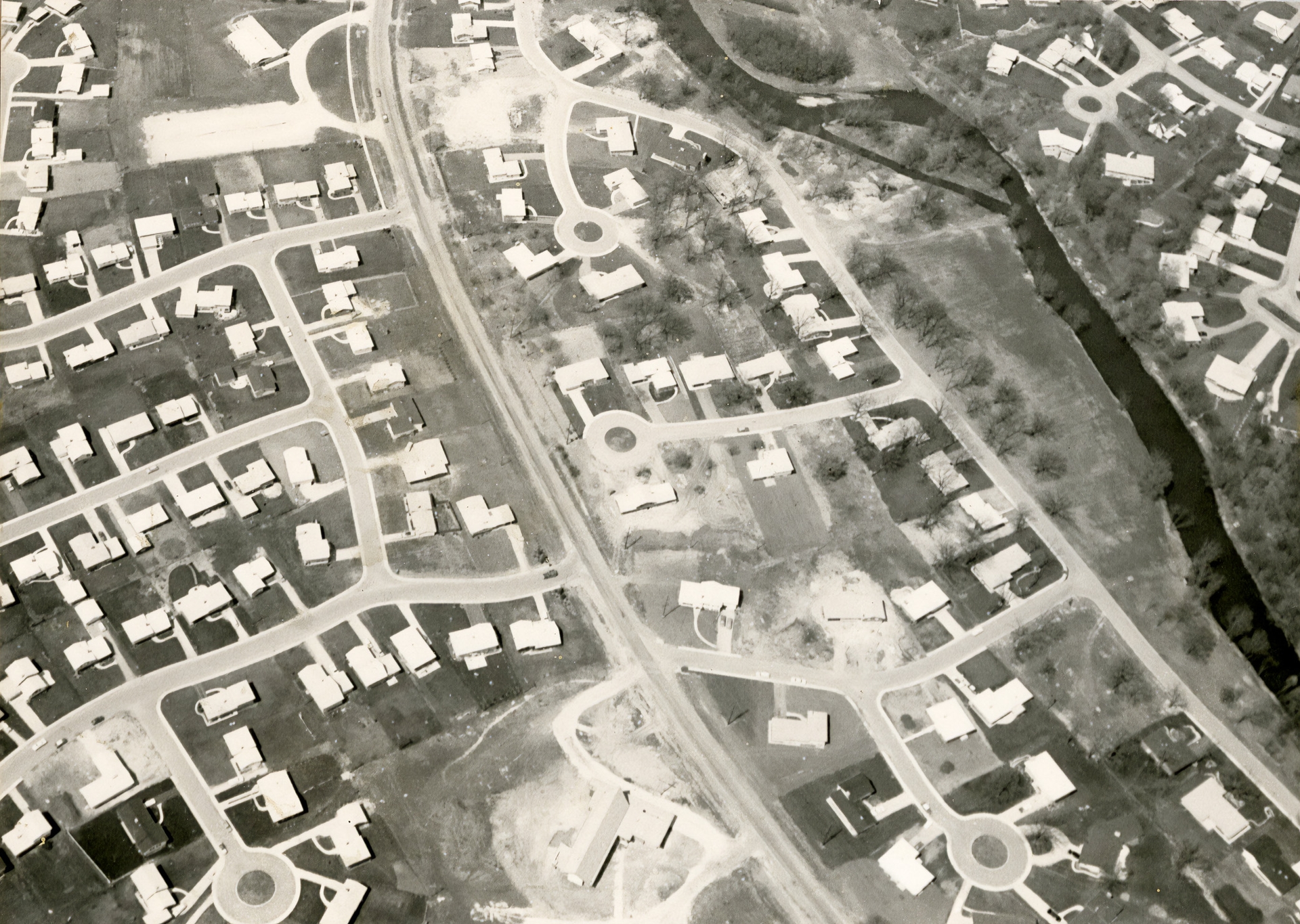 In places like Naperville, Illinois, farmland was converted into suburban tract housing during the postwar boom. Aerial view of Moser Development.